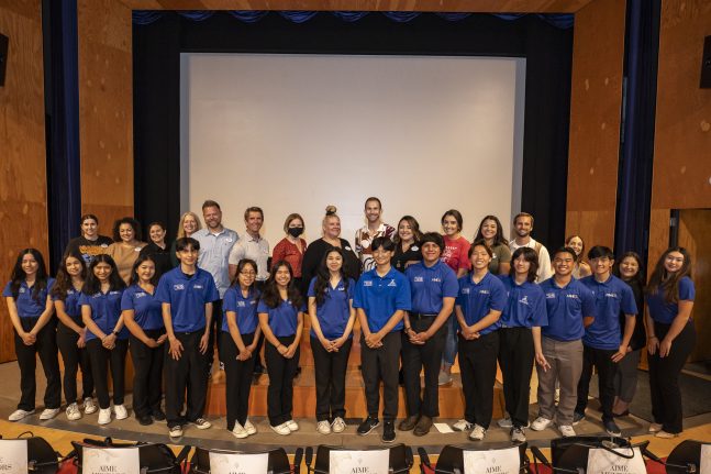 AIME students are joined by their mentors at the program's final presentation event.