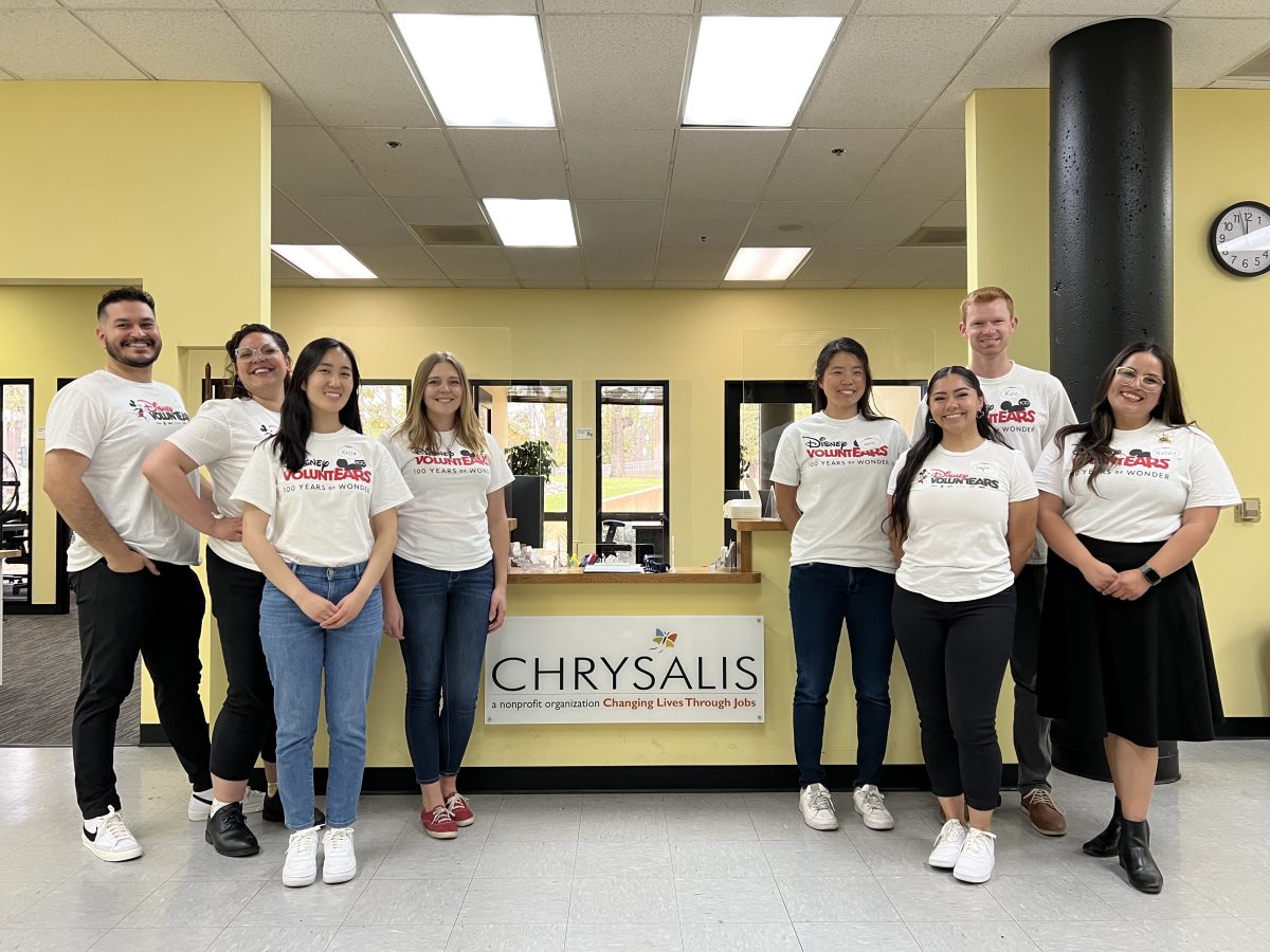 disney voluntears standing by chrysalis sign