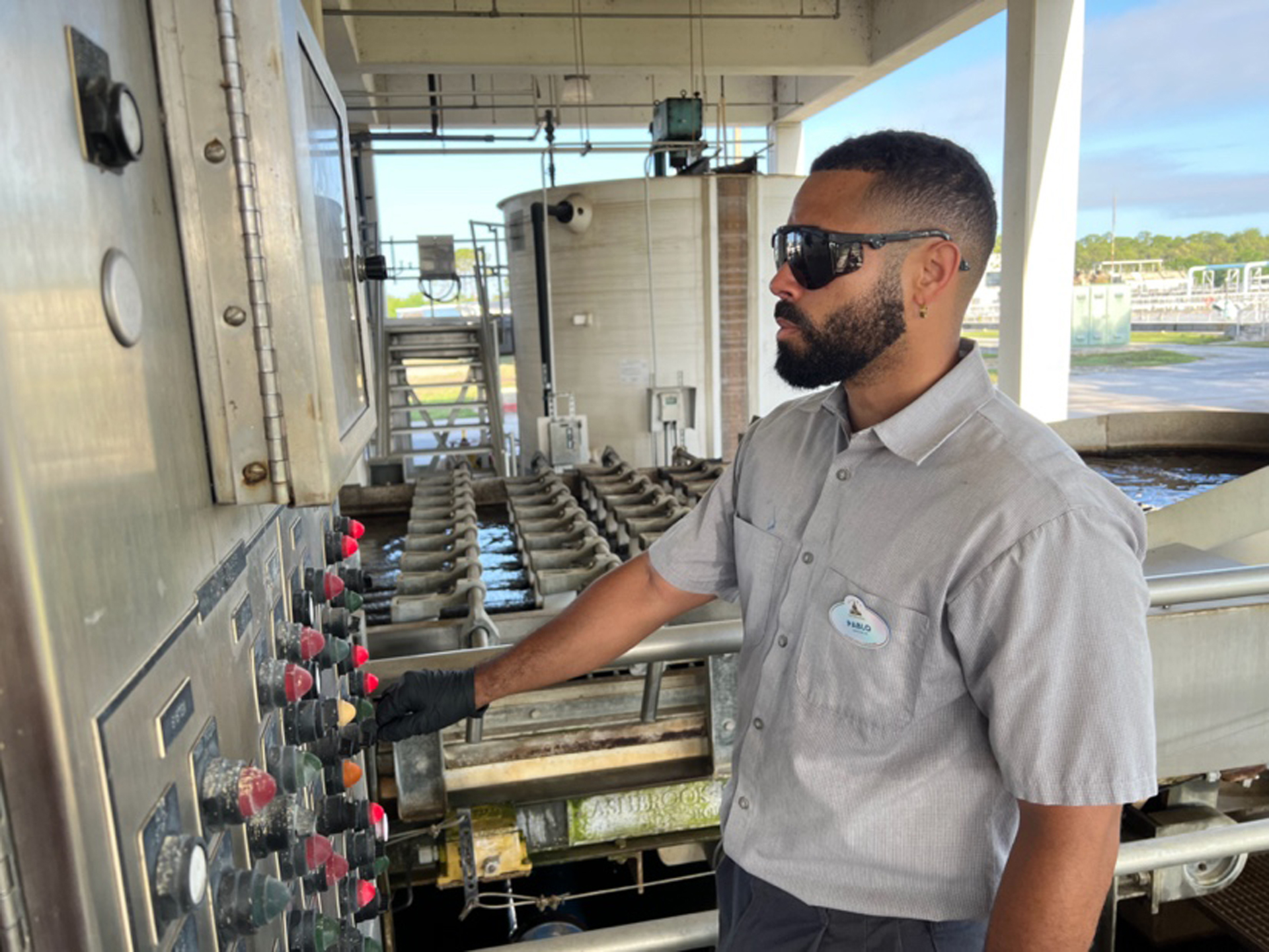 A Disney cast member operating machinery.